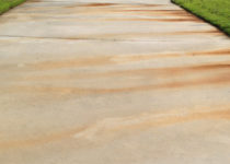 Rust / Iron Stains Embedded onto Concrete Driveways